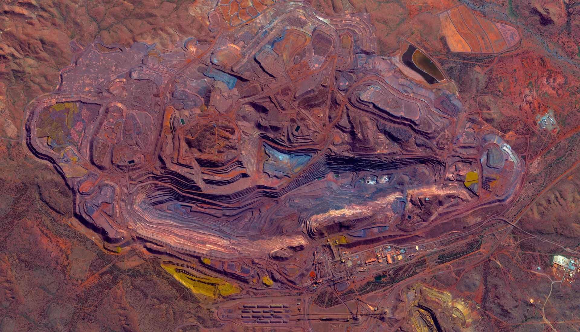 An aerial view of an open pit mine.