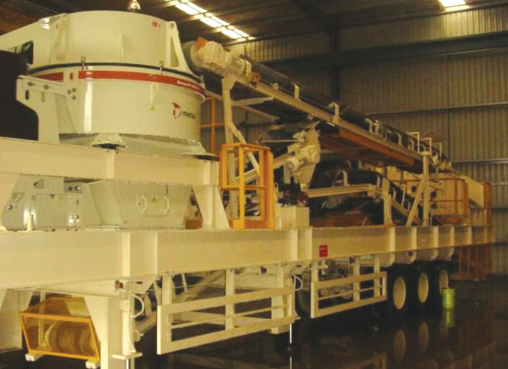 An Auto Draft machine is sitting in a warehouse.